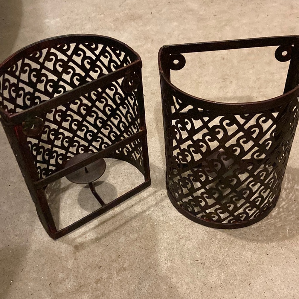 A pair (2) of bronze candleholders (wall sconces).  Can be hung outside.